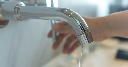 Turning on faucet